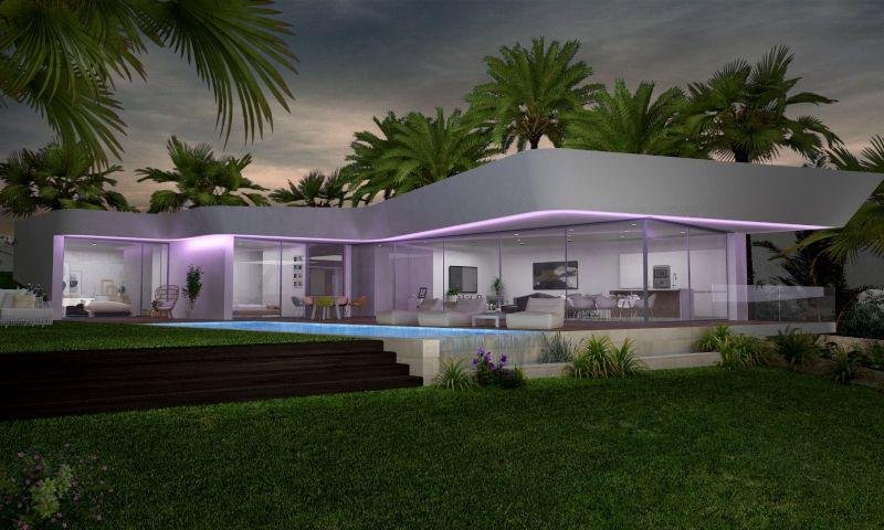 Casa moderna con jardín verde