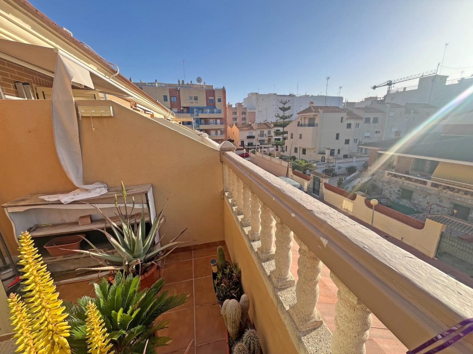 Terraza con vista al barrio